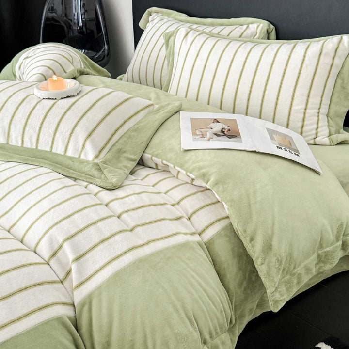 Luxurious bedding set made of striped cotton blend with velvet trim and reversible function