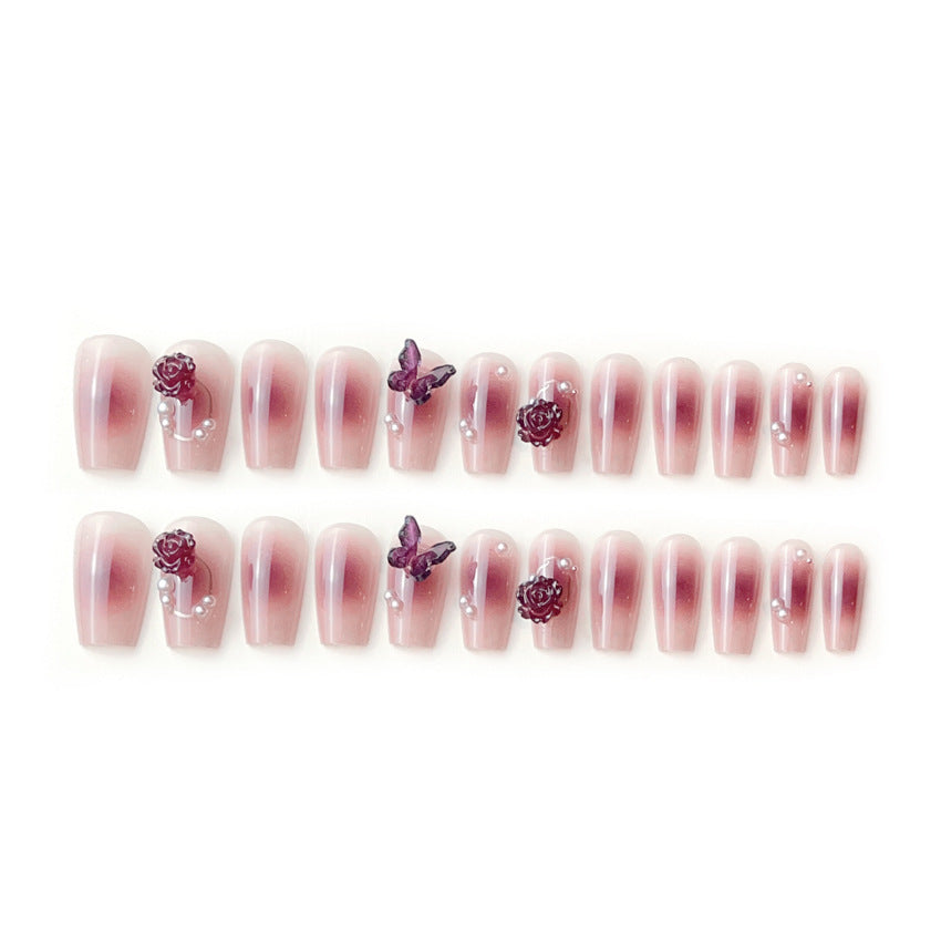 Playful artificial nails with cute animal motifs and floral accents Stornfield