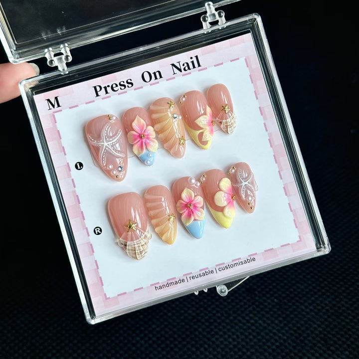 Artistic Press-On Nail Set with Floral and Shell Designs