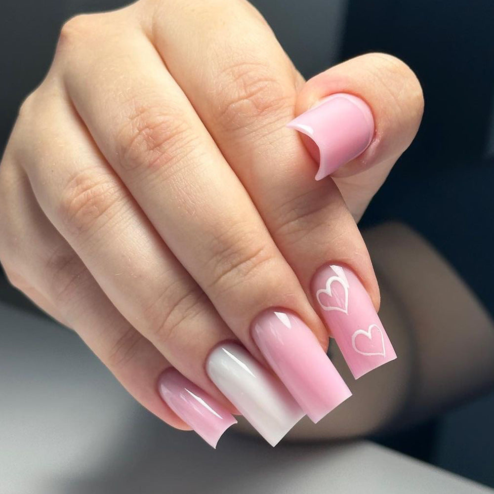 Artful Nail Extensions with Heart Patterns Stornfield