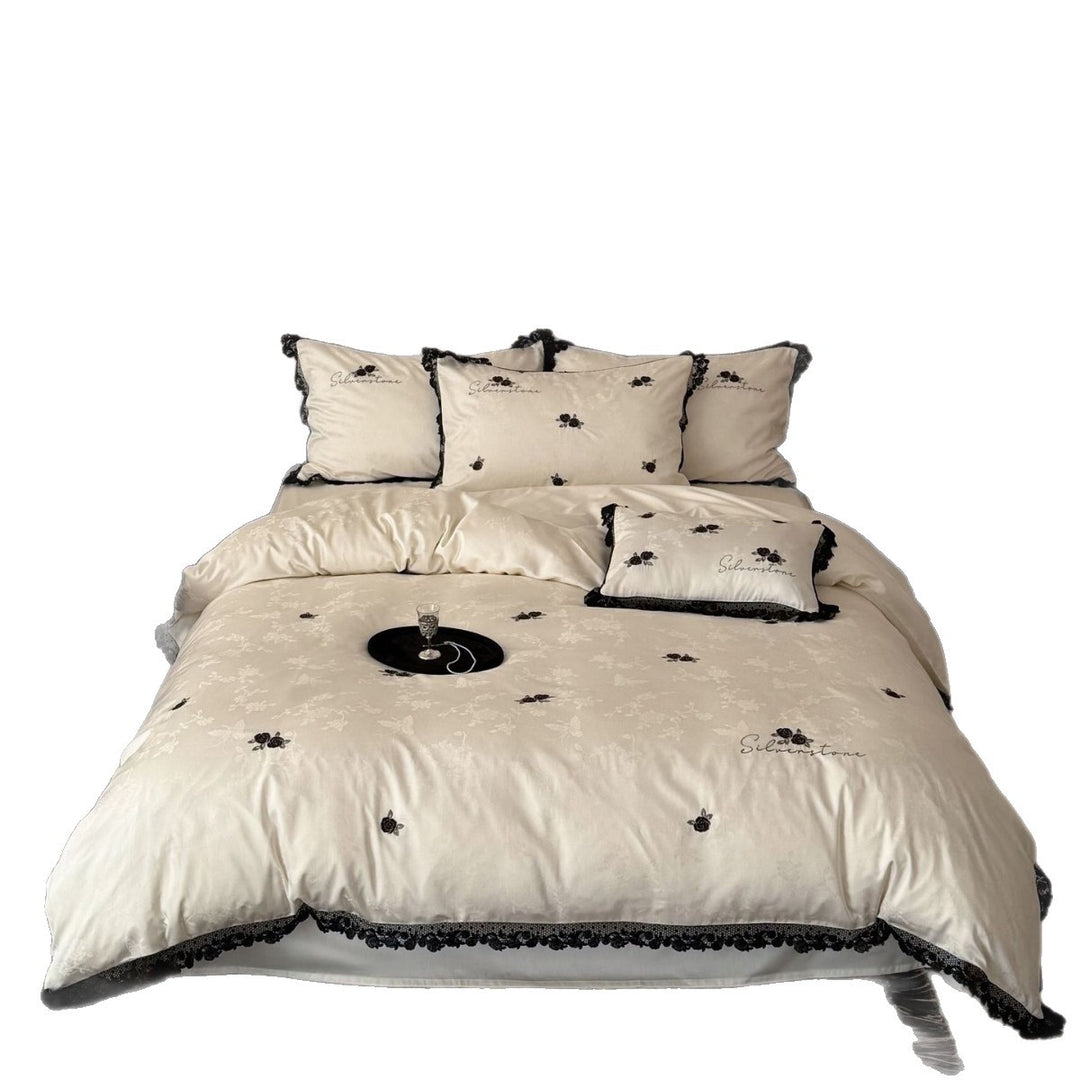 Luxurious cotton satin bedding set with lace border and rose embroidery