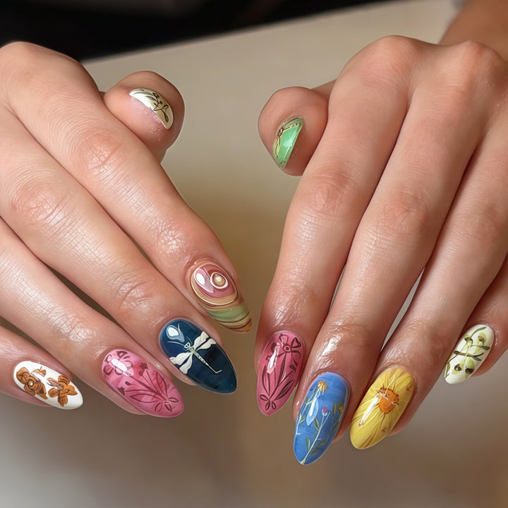 Nail art set with creative hand-painted designs and elegant details Stornfield