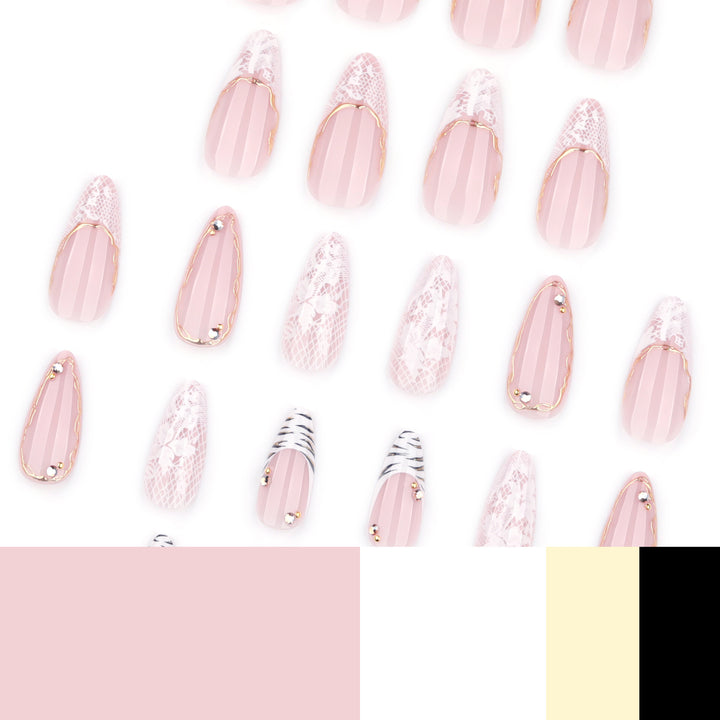 Artful stiletto nails with gold and tip embellishments Stornfield