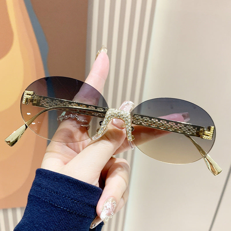 Women's sunglasses with glittering frame and oval lenses Stornfield