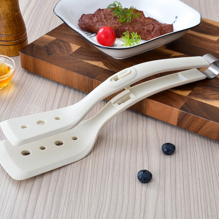 Ergonomic silicone spatula with stainless steel accents Stornfield