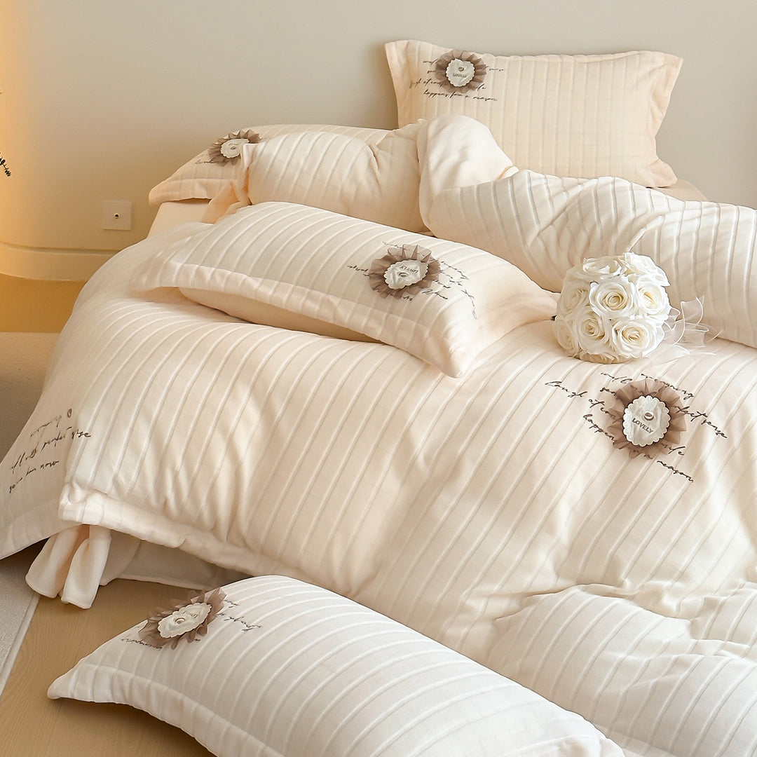 Quilted Sateen Duvet Cover Bedding Set with Appliqué Rosette & Embroidered Script