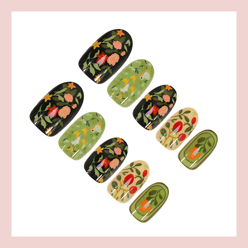 Artificial nail set with floral motifs and glitter accents Stornfield