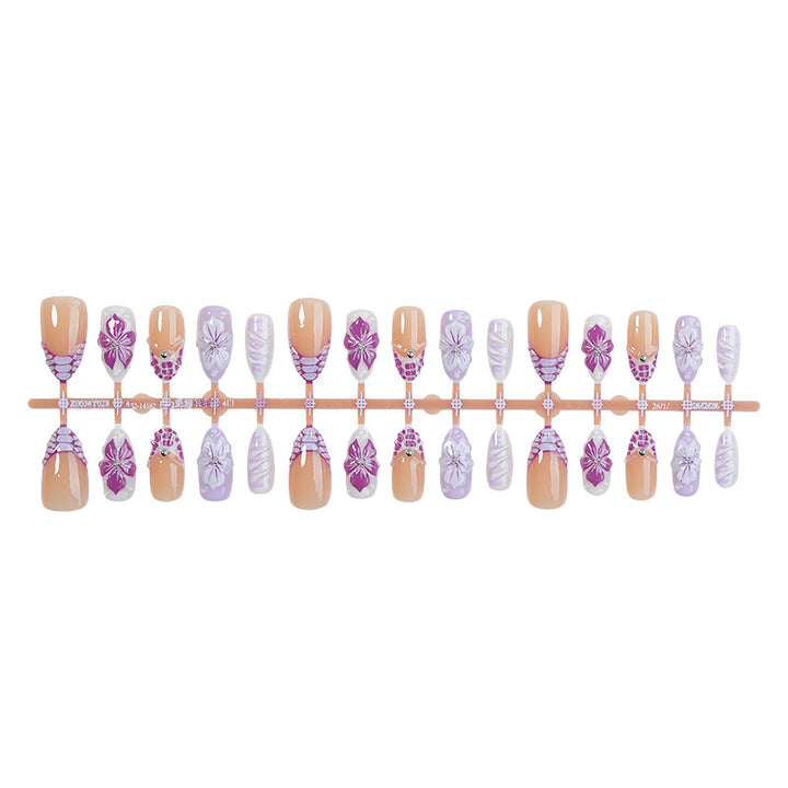 Artificial nail set with elegant flower designs and glitter accents Stornfield