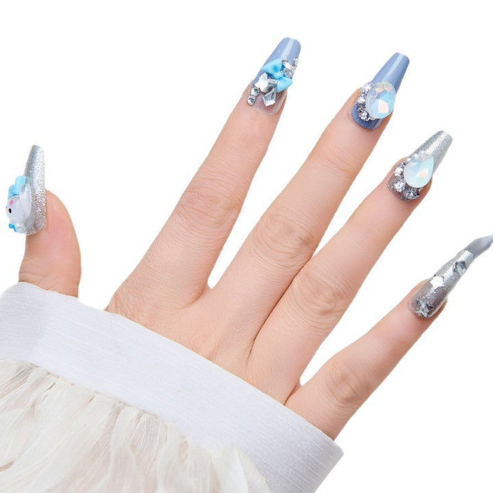 Creative artificial nails with 3D design and glitter accents Stornfield