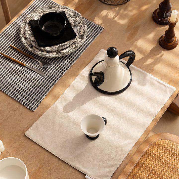 Rectangular table set made of woven herringbone cotton blend with anti-slip coating Stornfield