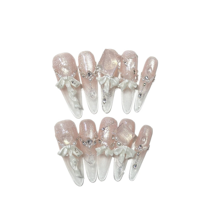 Elegant Press-On Acrylic Nail Set with Decorative Bow and Glitter Accents Stornfield