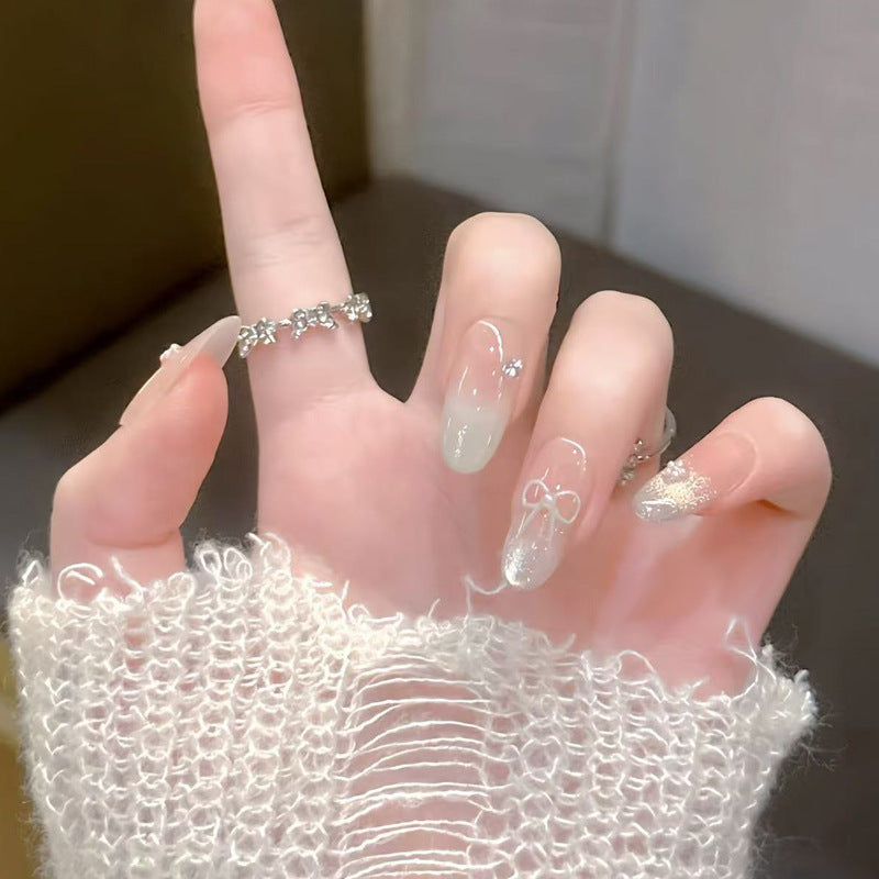 Artistic Press-On Nail Set with Bow and Floral Details Stornfield