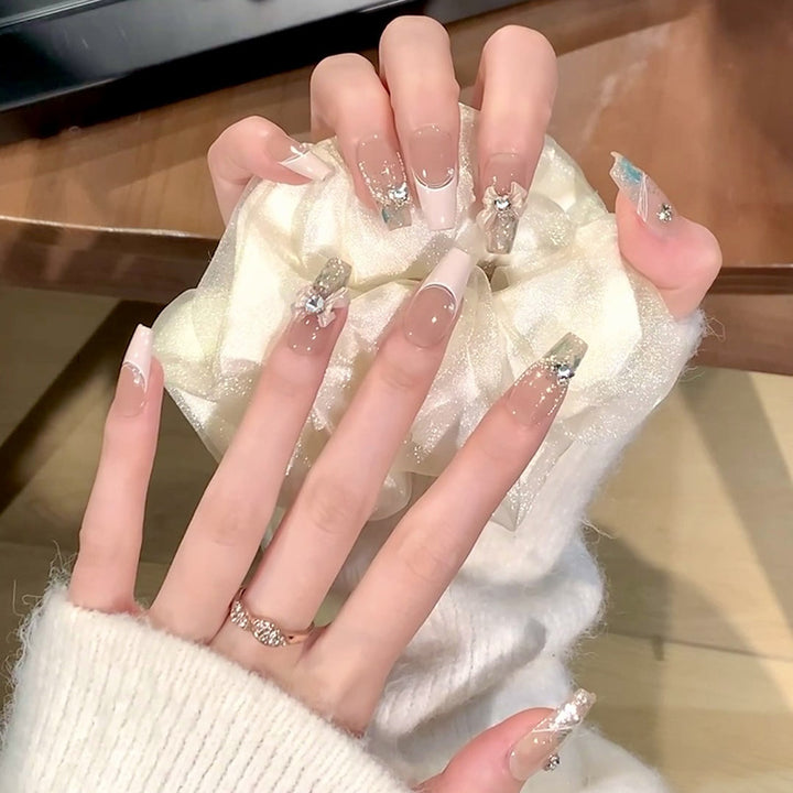 Glamorous artificial nails with glitter design Stornfield