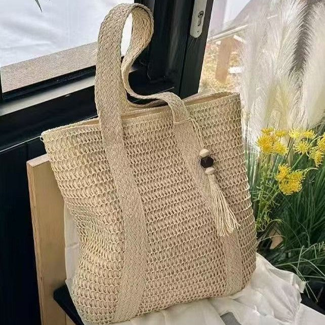 Handbag Made of Natural Weave with Decorative Tassel Detail Stornfield