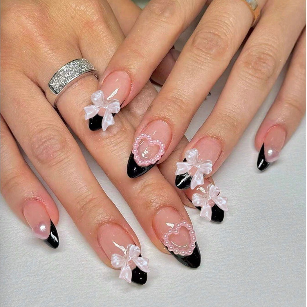 Glamorous artificial nail tips with 3D bows and heart decorations Stornfield