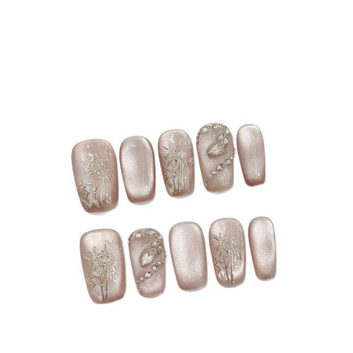 Elegant Press-On Nail Art Set with Floral and Gem Accents