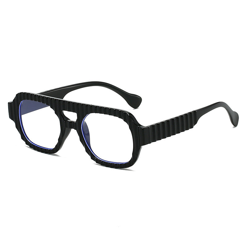 Ladies fashionable sunglasses in futuristic design with textured frame Stornfield