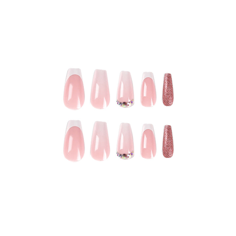 Glamorous artificial nails with rhinestone accents Stornfield