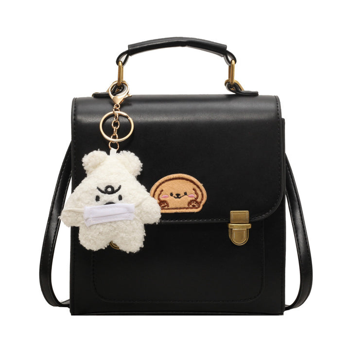 Playful Cartoon-Embroidered Satchel Bag Stornfield