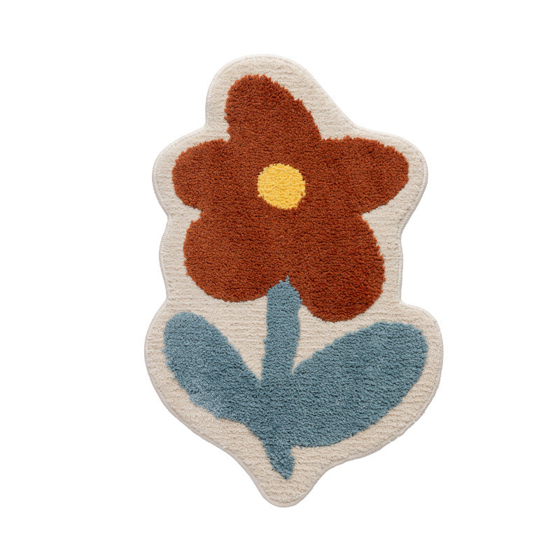 Flower-shaped hand-tufted bath mat with voluminous pile and non-slip latex backing Stornfield