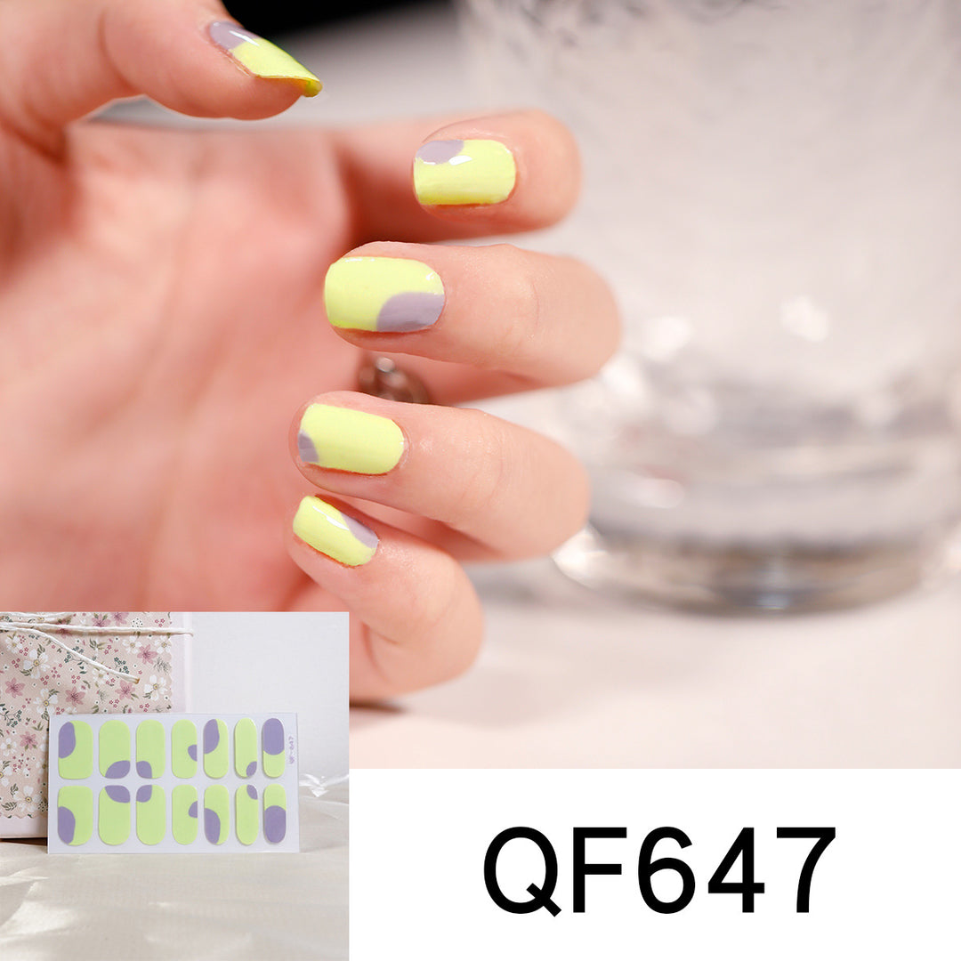 Artificial nail art with heart-shaped designs and soft color gradients Stornfield
