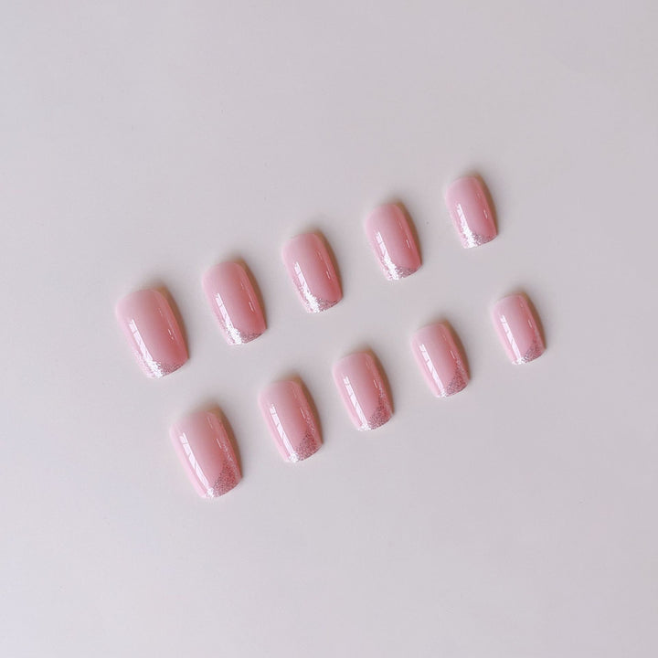 Acrylic nail set with shimmering glitter tips Stornfield