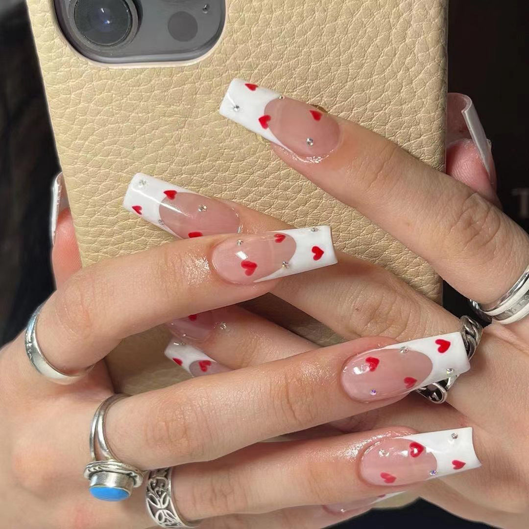 Creative nail art with heart design Stornfield