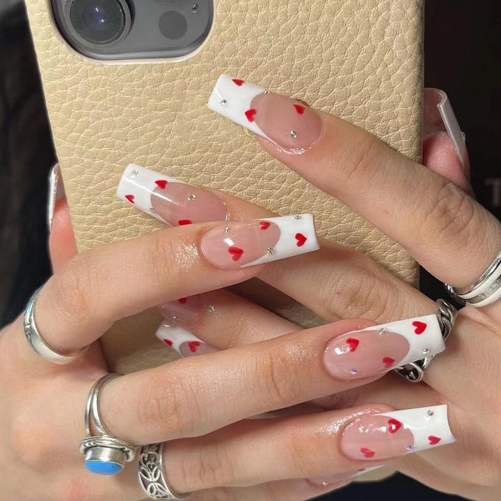 Creative nail art with heart design Stornfield