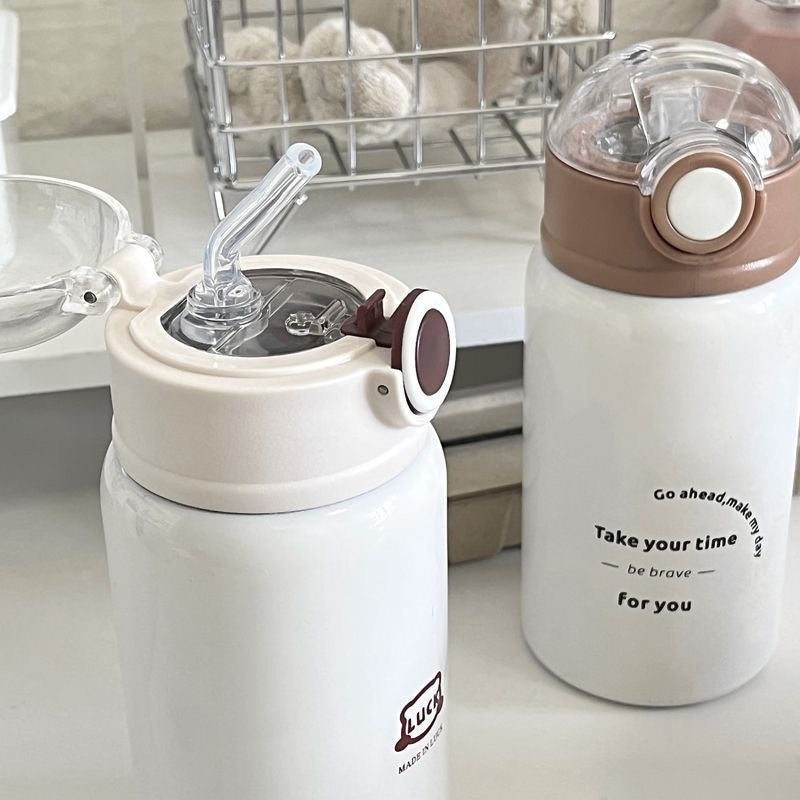 Women's insulated drinking bottle with innovative flip lid and practical handle Stornfield