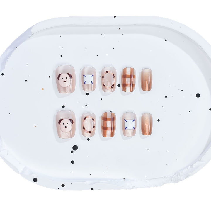 Playful artificial nails with cute animal and pattern accents Stornfield