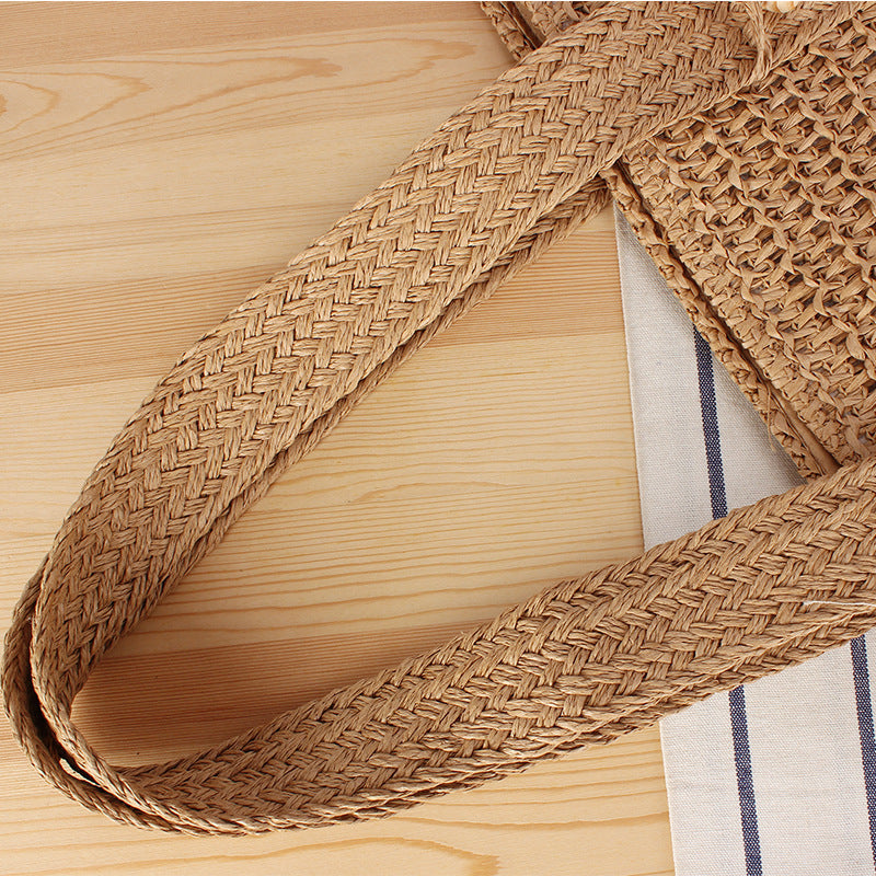 Eco-friendly straw tote bag with elegant tassel detail Stornfield