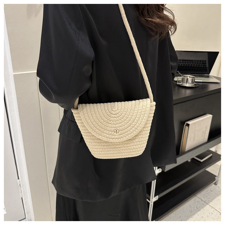 Hand-knotted mini bag with curved design Stornfield