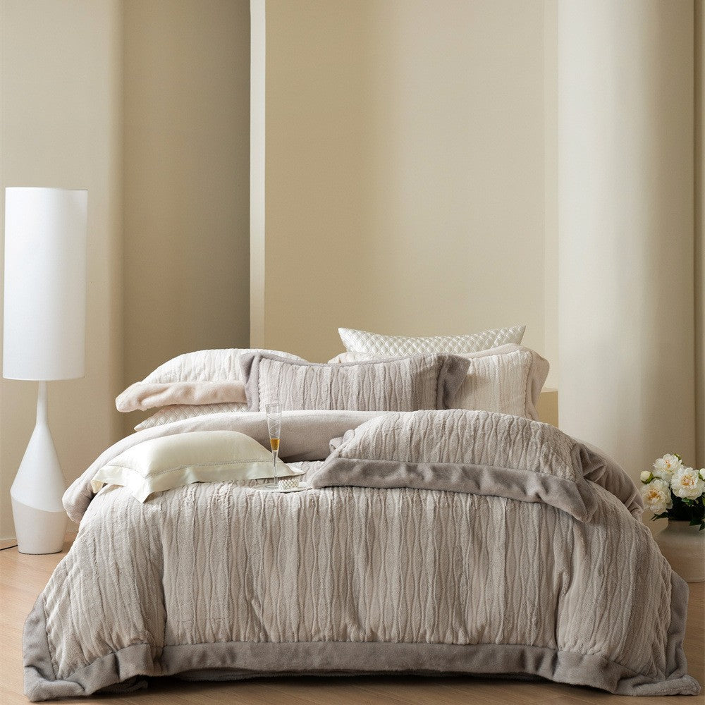 Cozy quilted reversible duvet cover with faux fur trim