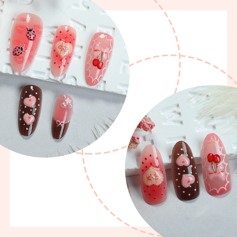 Artificial nail set with floral and playful tea motifs Stornfield