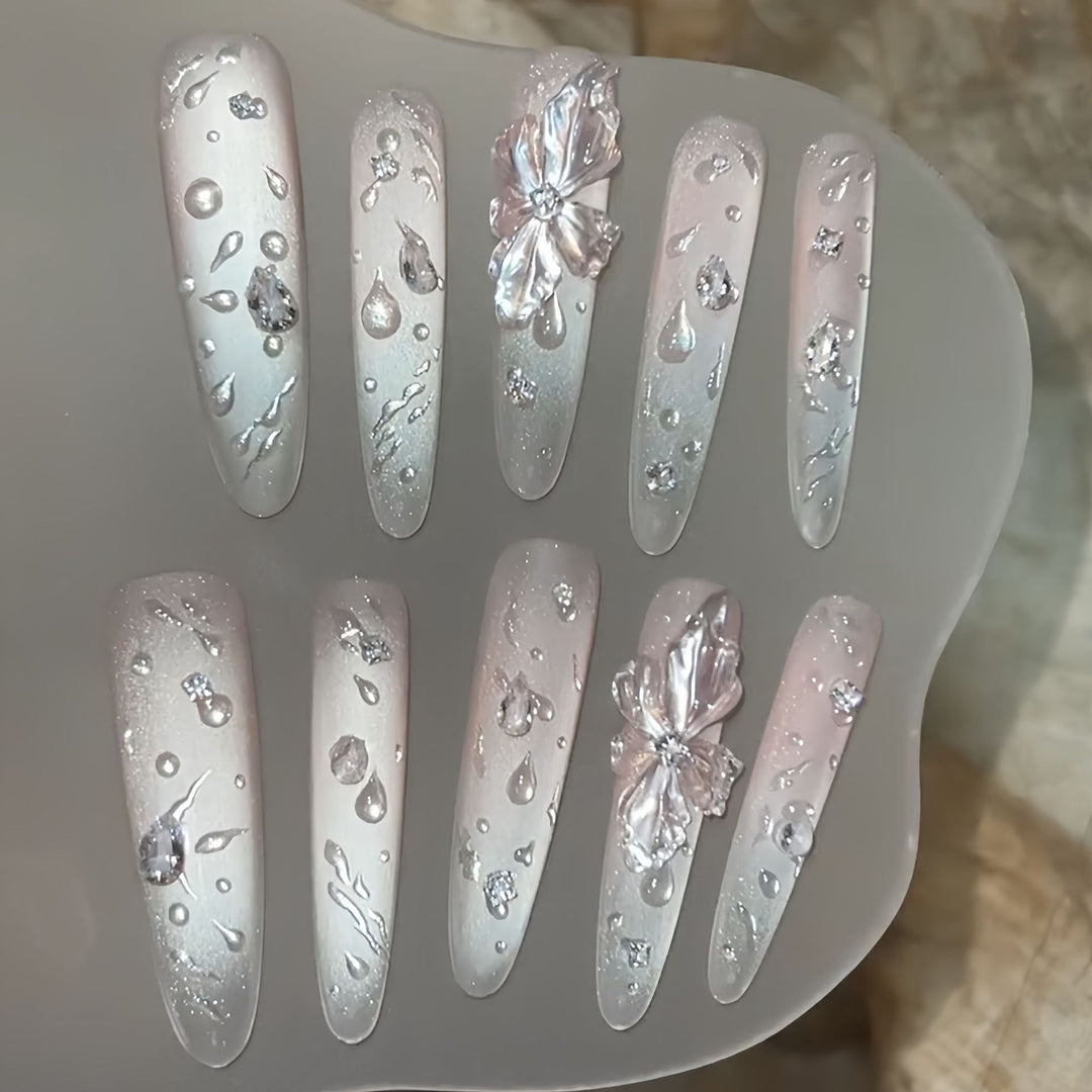 Glamorous artificial nails with sparkling accents Stornfield