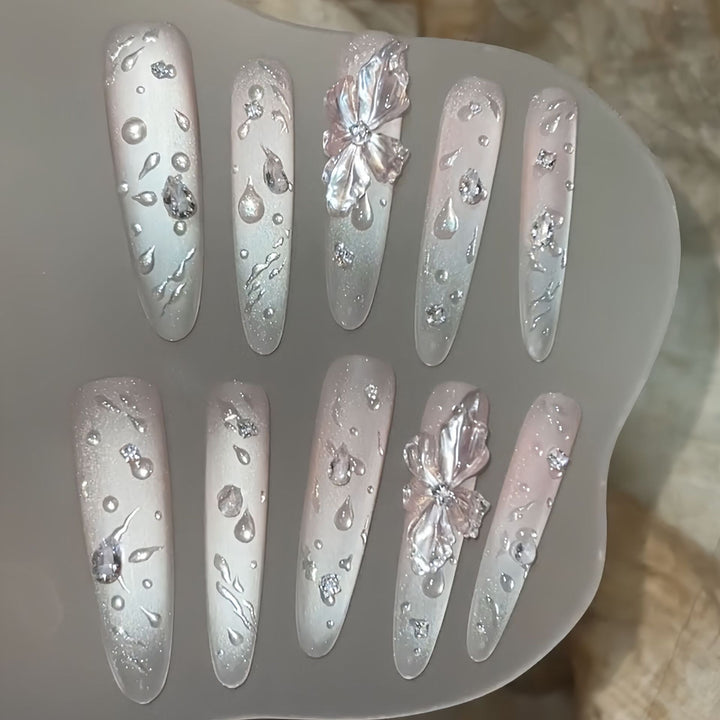 Glamorous artificial nails with sparkling accents Stornfield