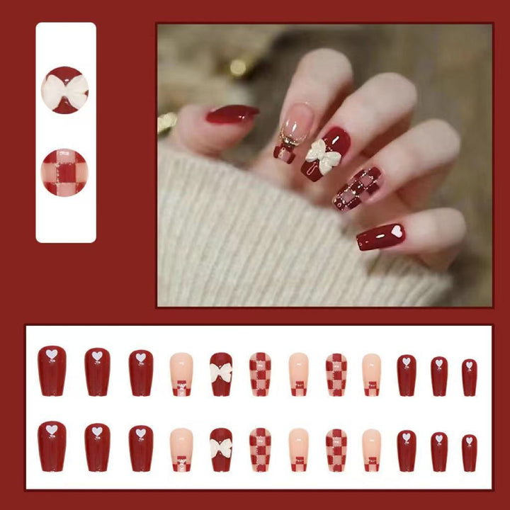 Artificial nails with decorative heart and bow details Stornfield