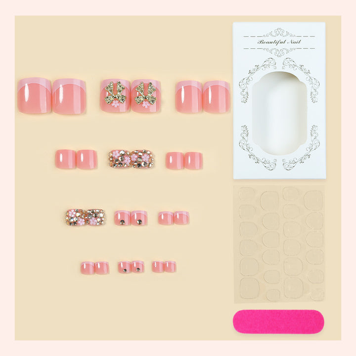 Artificial nail set with glamorous decorations and shimmering accents Stornfield