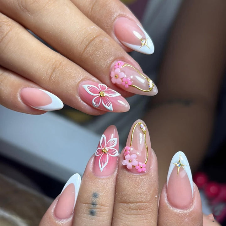 Artful acrylic nails with elegant floral accents Stornfield