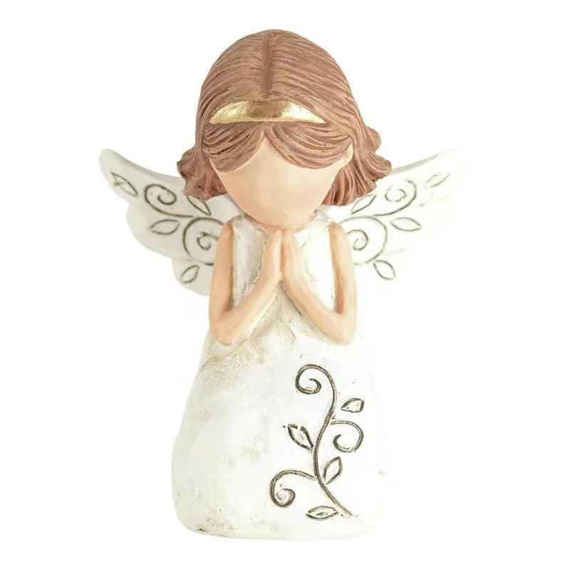 Women's Angel Figurine Holding Book