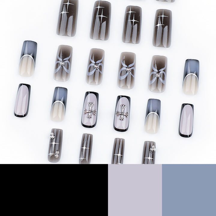 Artful acrylic nails with unique jewelry embellishments Stornfield