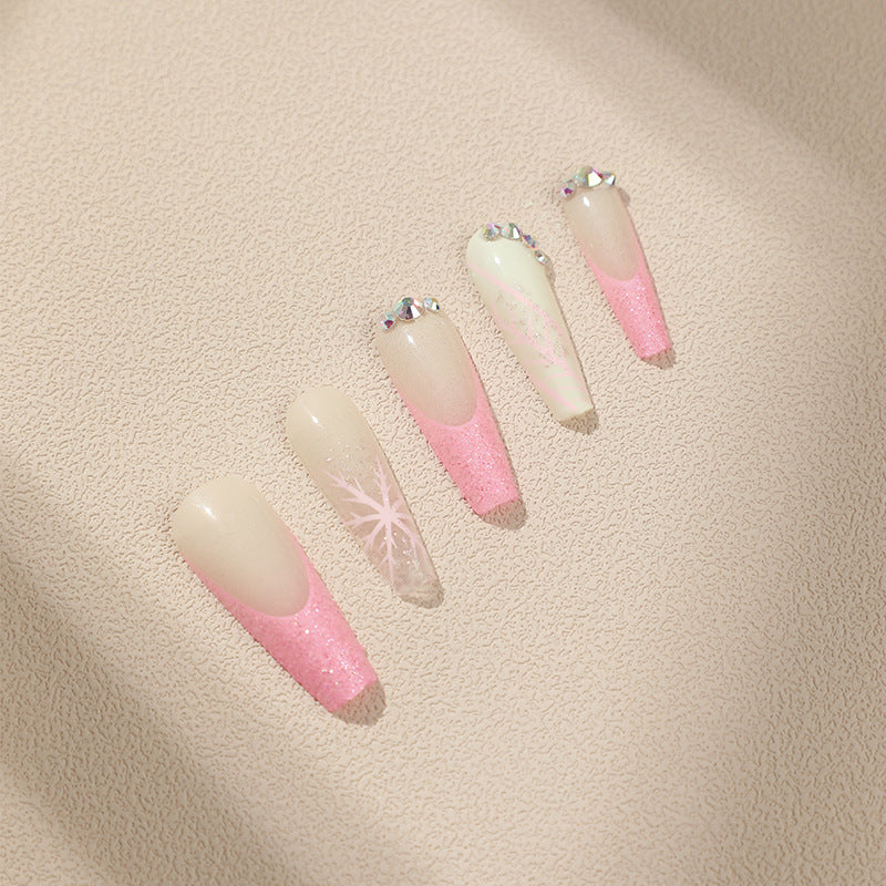 Artistic stiletto nails with glitter and snowflake design Stornfield