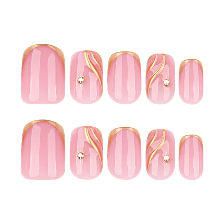 Artificial nail art with glamorous golden accents Stornfield