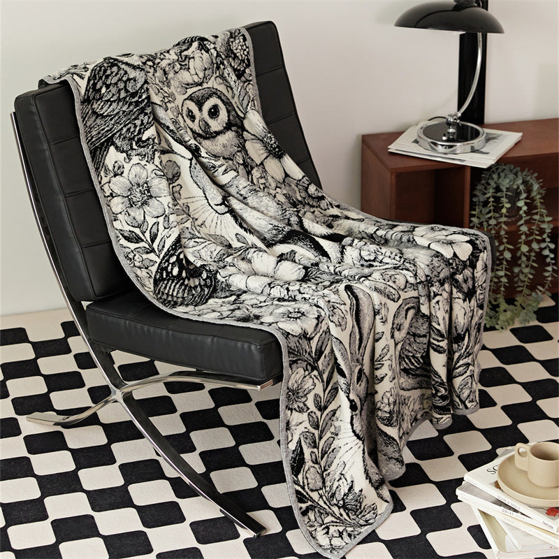 Cozy throw blanket with detailed jacquard animal motif