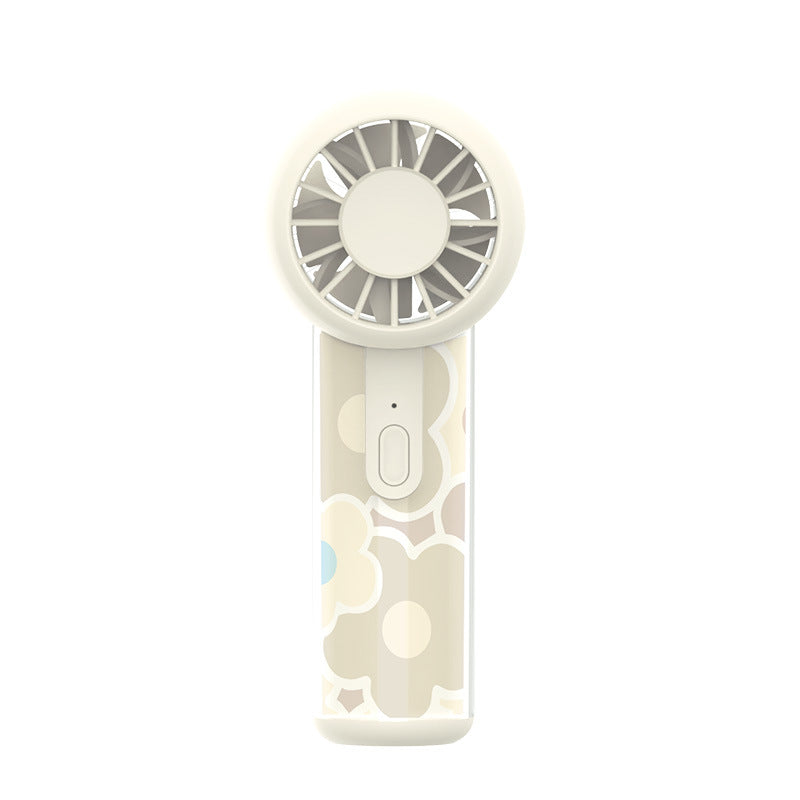 Unisex nano compact portable handheld fan rechargeable via USB with quiet operation and ergonomic grip Stornfield