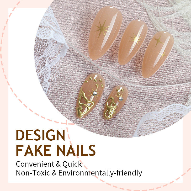 Creative nail set with elegant gold embellishments and sparkling accents Stornfield