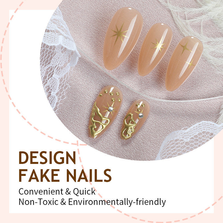 Creative nail set with elegant gold embellishments and sparkling accents Stornfield