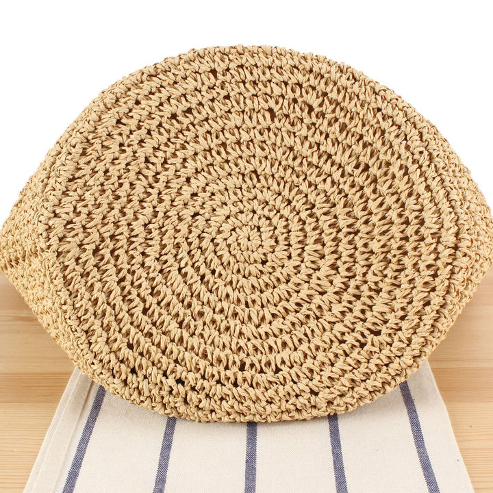 Hand-knotted beach bag with floral details Stornfield