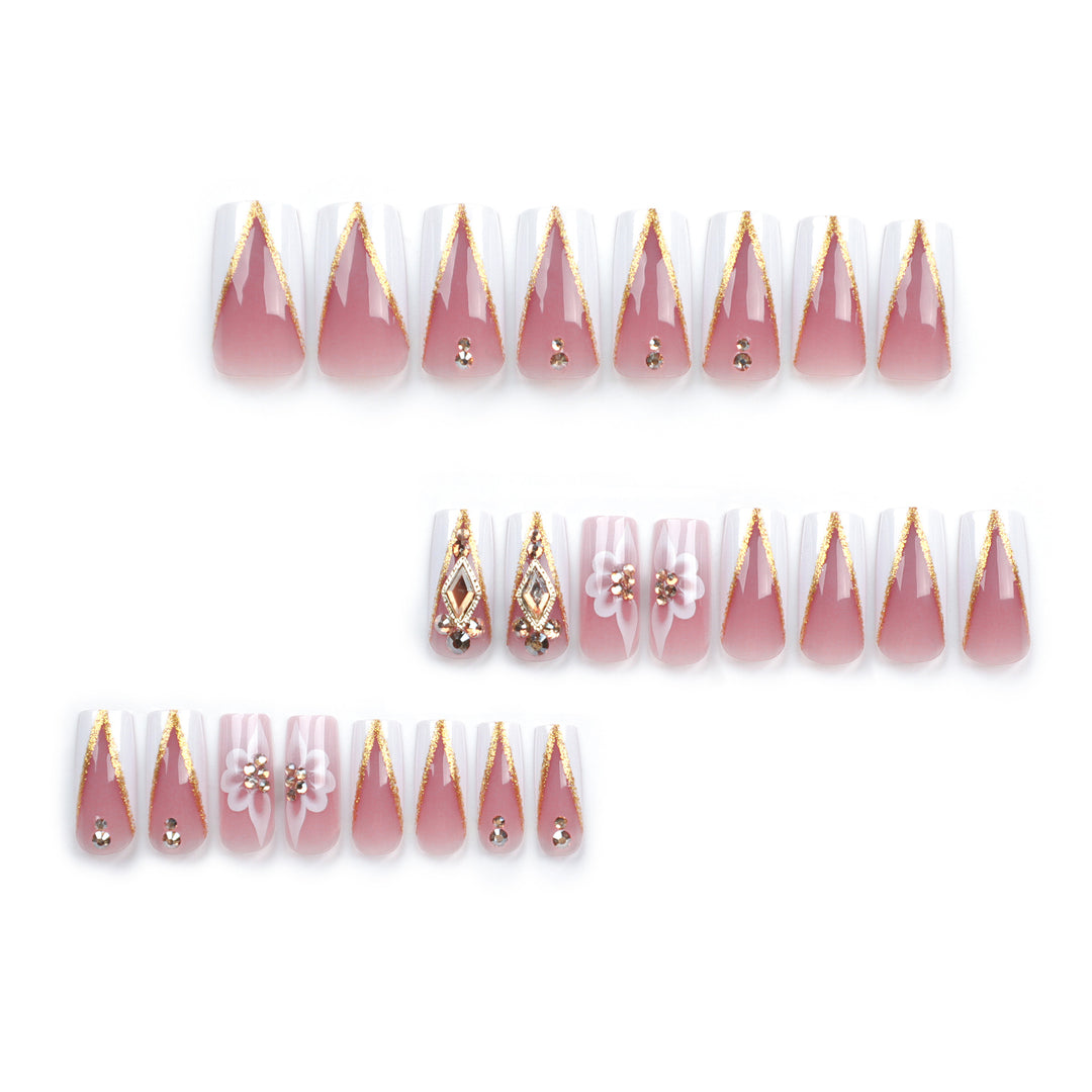 Artistic nail extensions with floral and glitter accents Stornfield