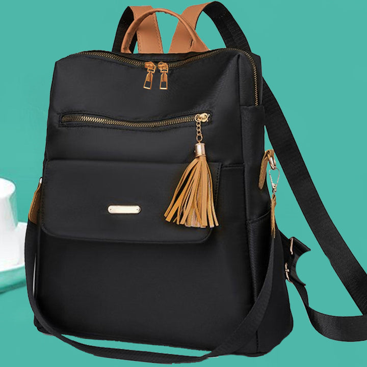 Multi-Functional Backpack with Decorative Tassel Stornfield
